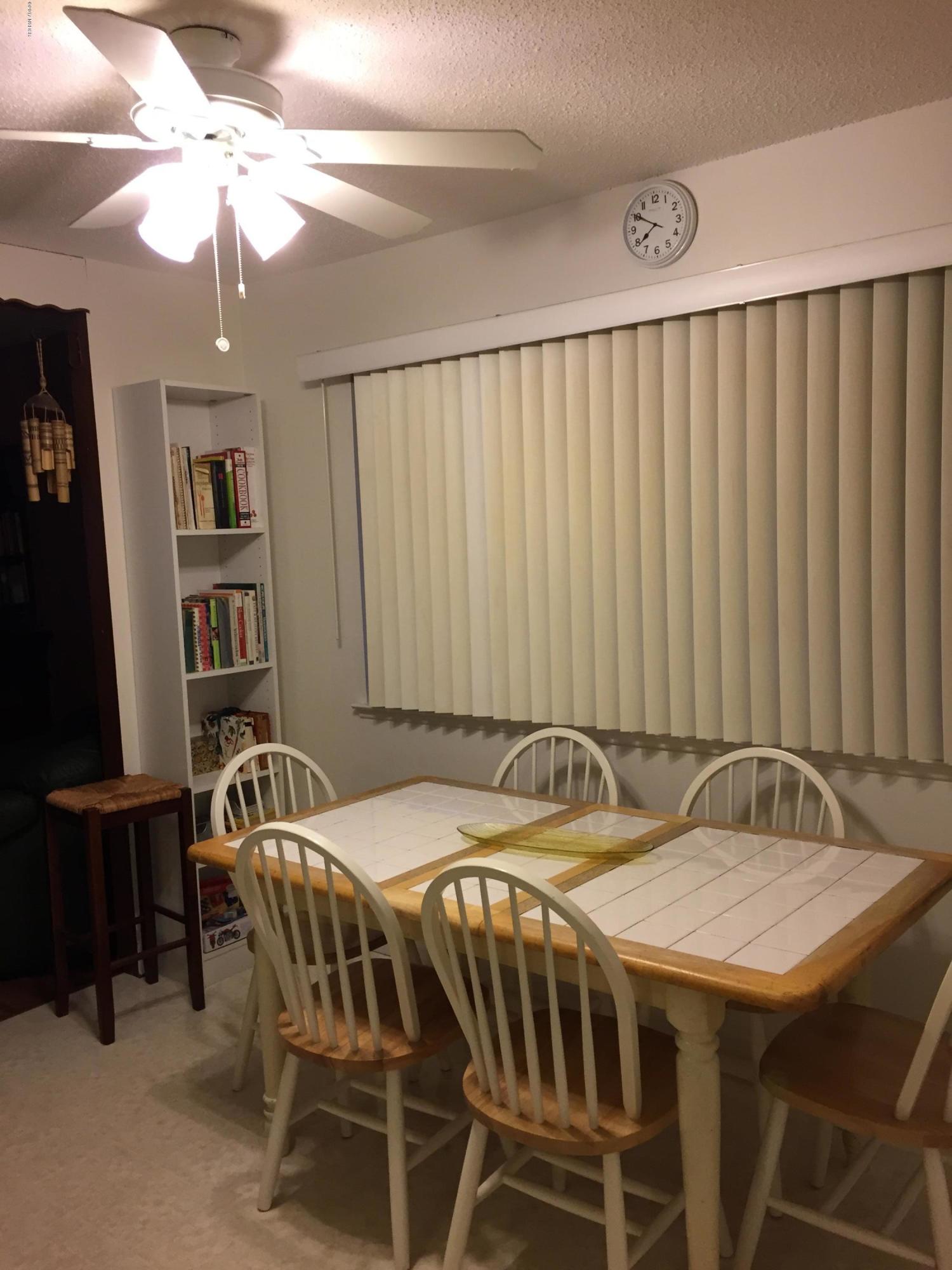4035 Rigel Avenue Lompoc, CA 93436 - Photo 10 of 35 a bed sitting in a bedroom next to a window