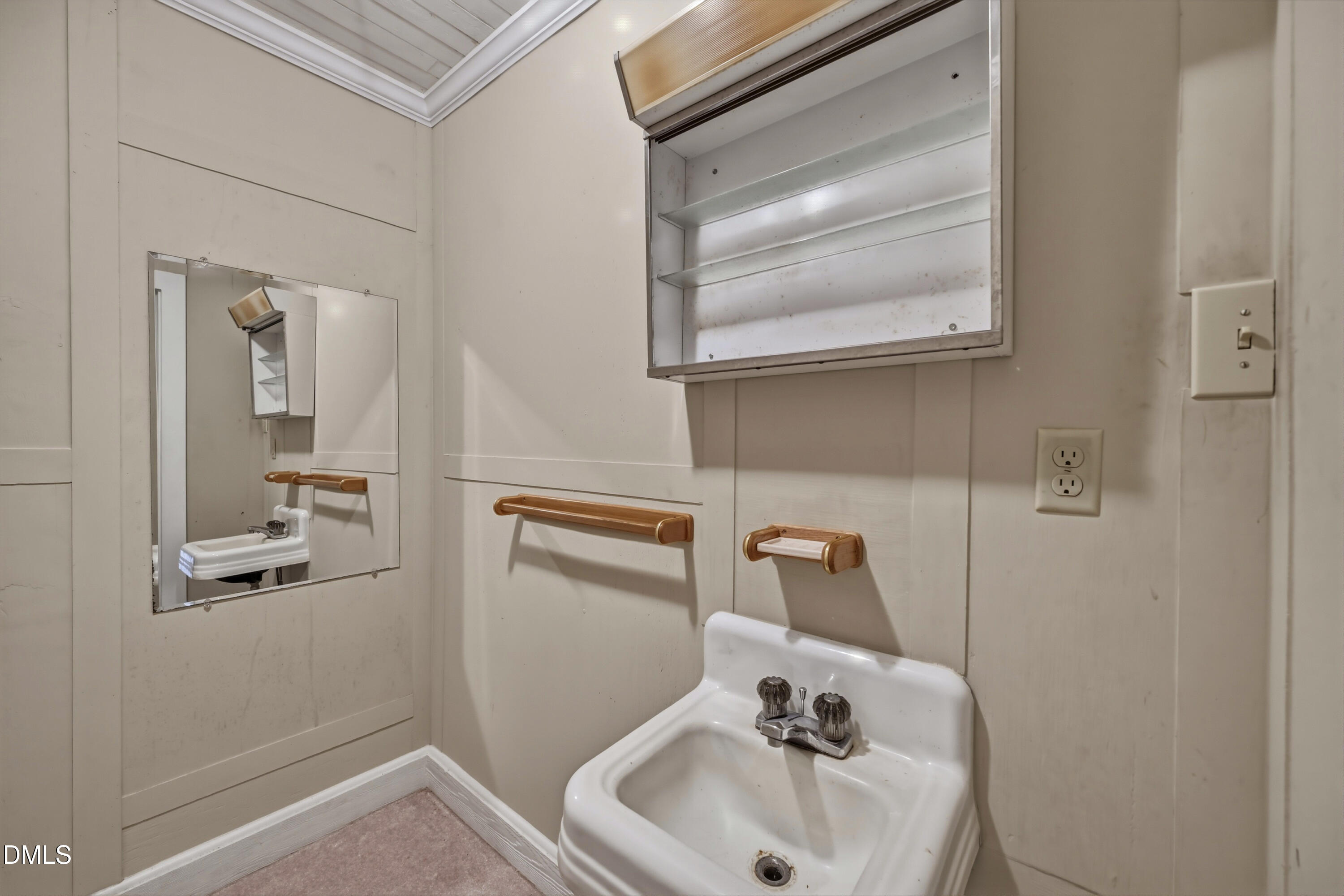 50 Robert Sledge Road Spring Hope, NC 27882 - Photo 21 of 50 a bathroom with a sink and mirror