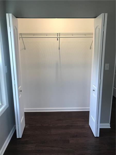 118 Sunflower Road Butler, PA 16001 - Photo 15 of 25 Master bedroom closet with shelving and light.