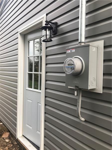 118 Sunflower Road Butler, PA 16001 - Photo 25 of 25 Brand new service with impressive panel in the garage! Side door gives access to the back/front yard and garage.