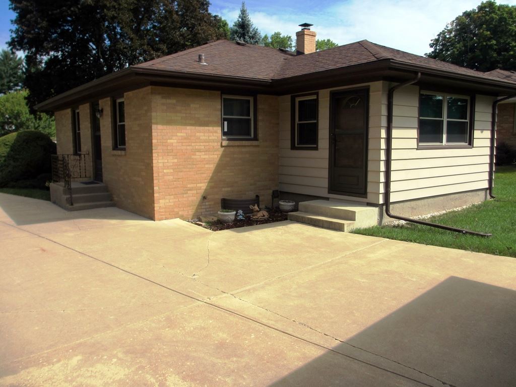 3729 Pinecrest Road Rockford, IL 61107 - Photo 3 of 22 a view of a house with a garage