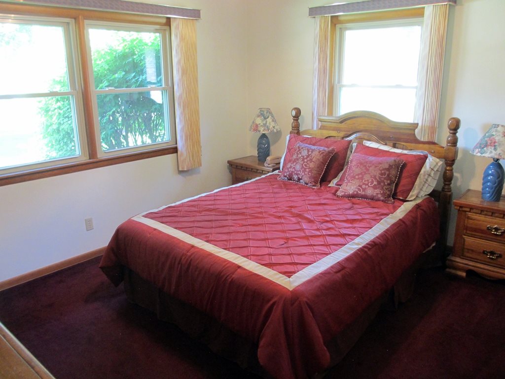 3729 Pinecrest Road Rockford, IL 61107 - Photo 10 of 22 a bed sitting in a bedroom next to a window