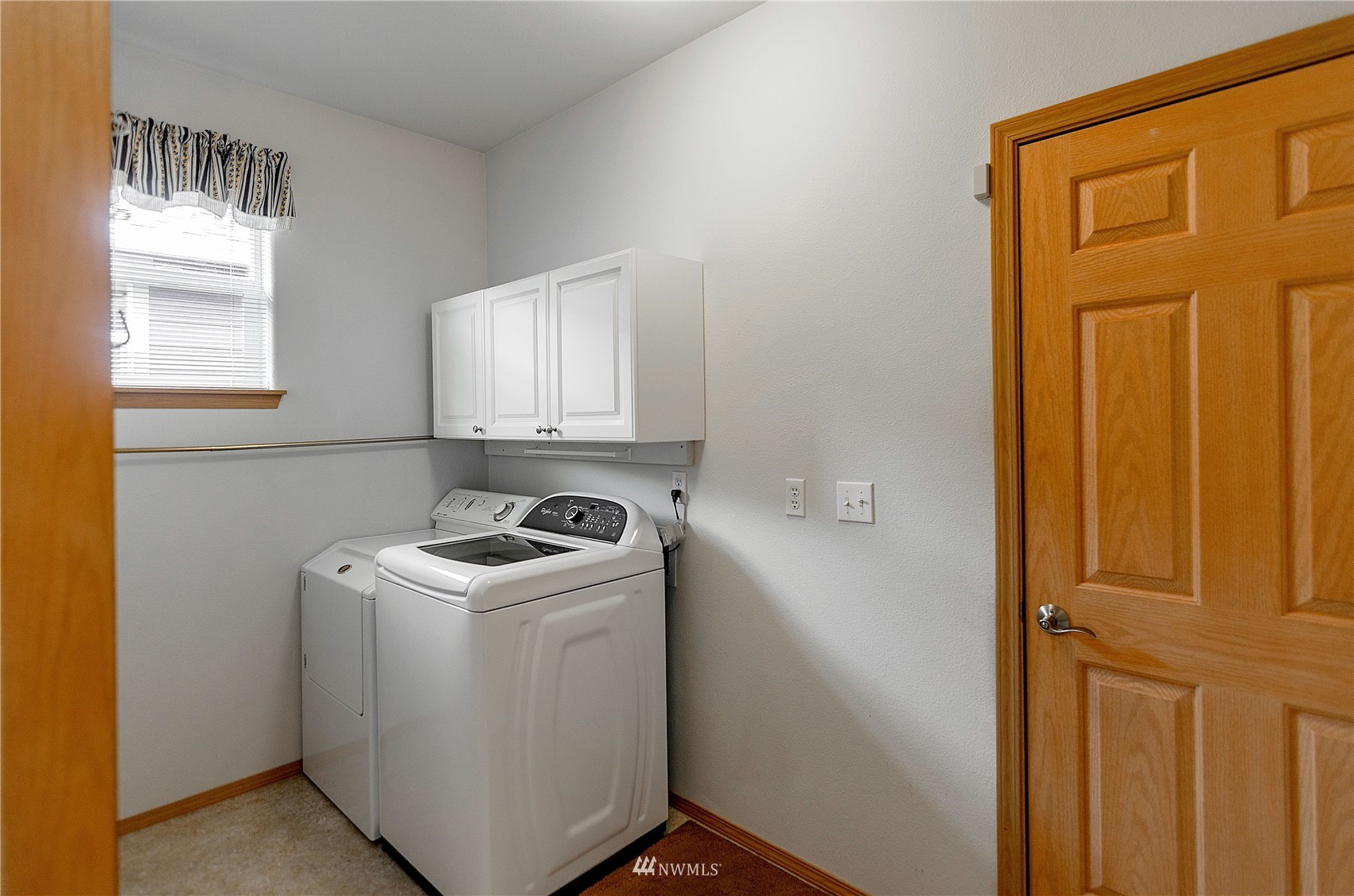 8228 Bainbridge Loop Northeast Lacey, WA 98516 - Photo 11 of 32 a room with storage and utility
