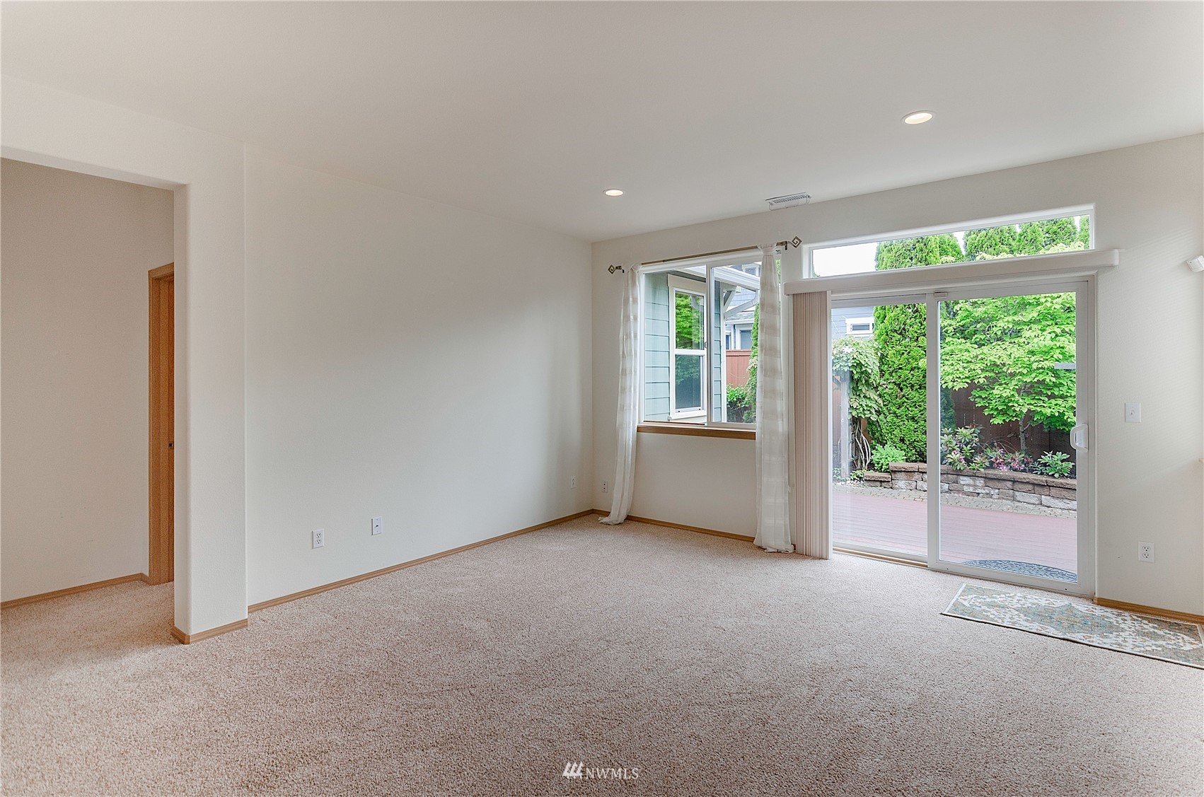 8228 Bainbridge Loop Northeast Lacey, WA 98516 - Photo 6 of 32 a view of an empty room with a window