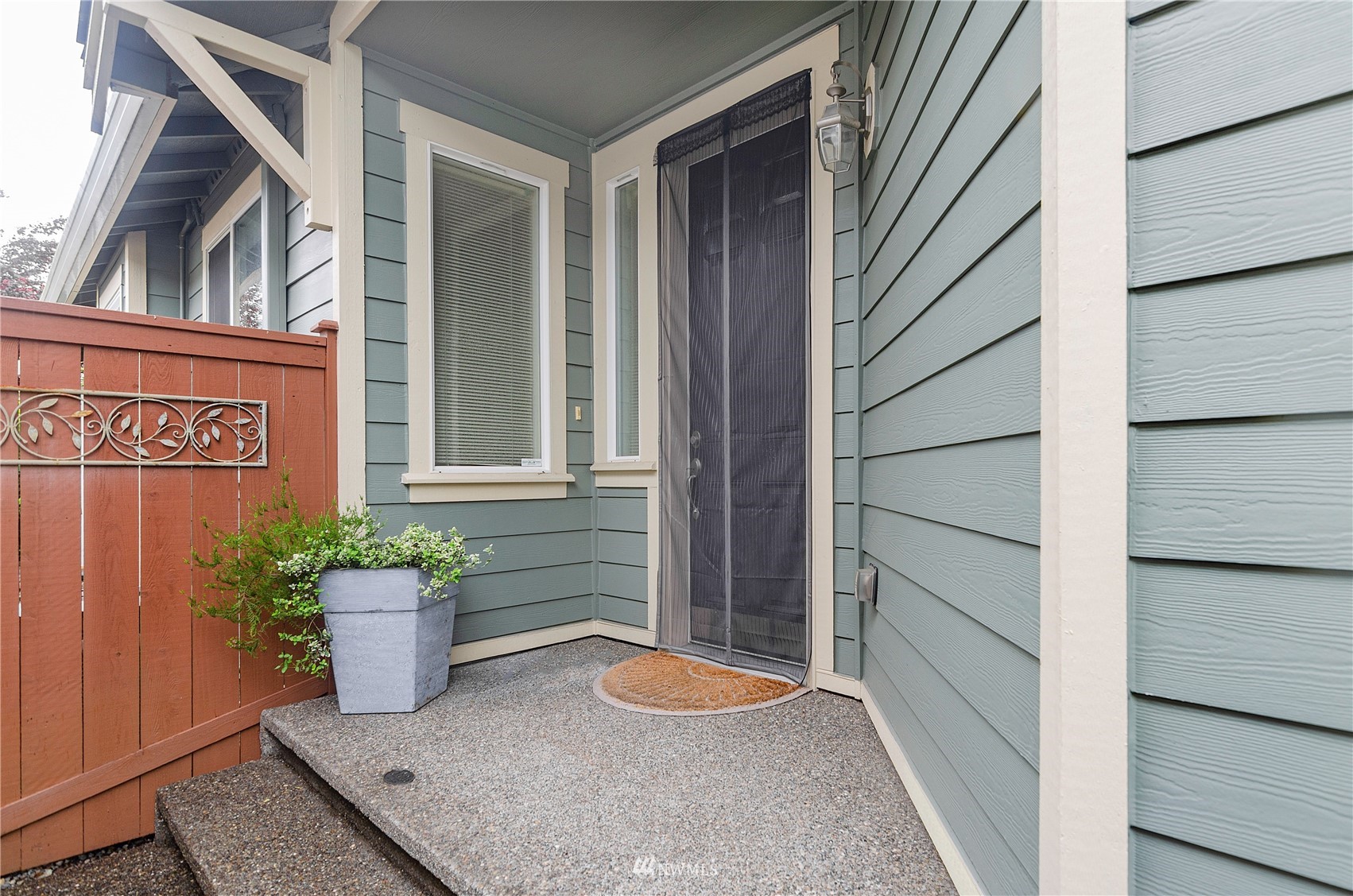 8228 Bainbridge Loop Northeast Lacey, WA 98516 - Photo 7 of 32 a view of a entryway door of the house