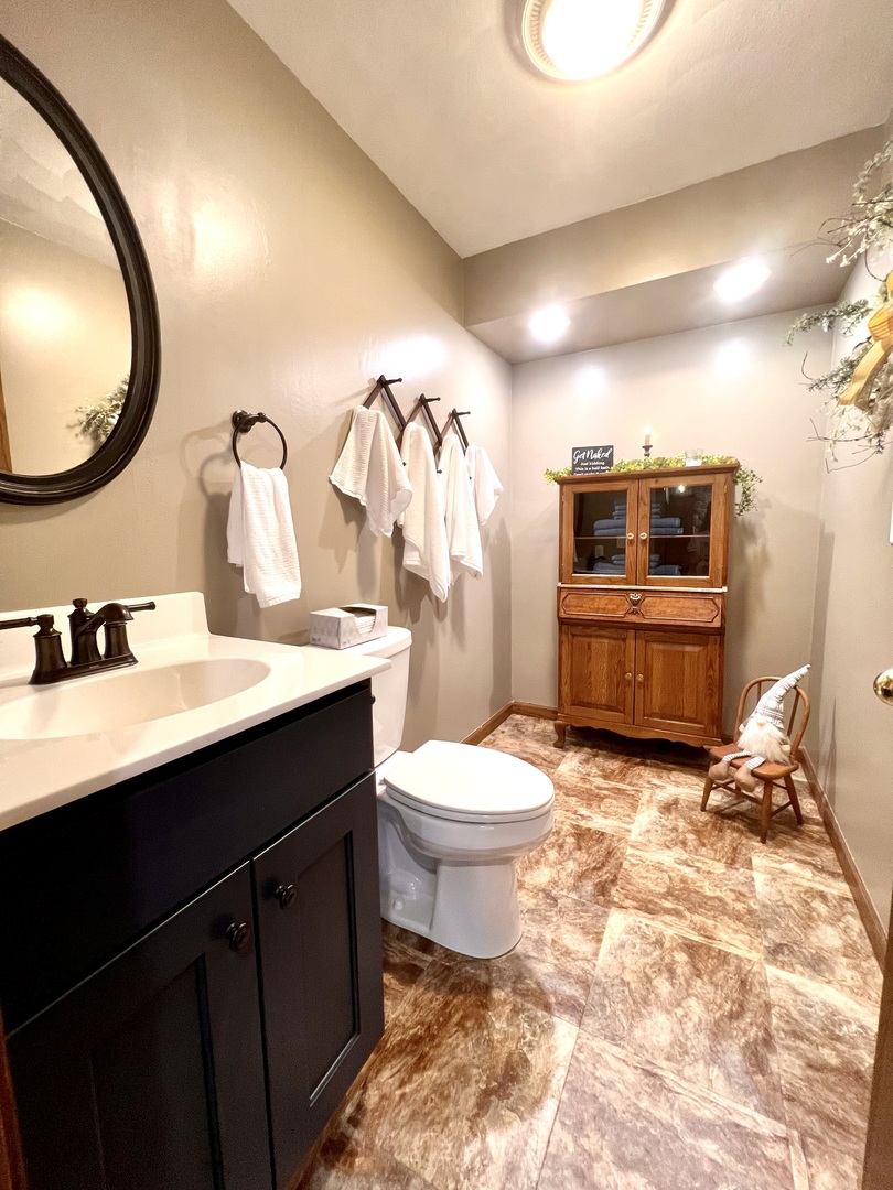 329 Rockside Drive Dixon, IL 61021 - Photo 15 of 23 a bathroom with a sink a toilet and a mirror