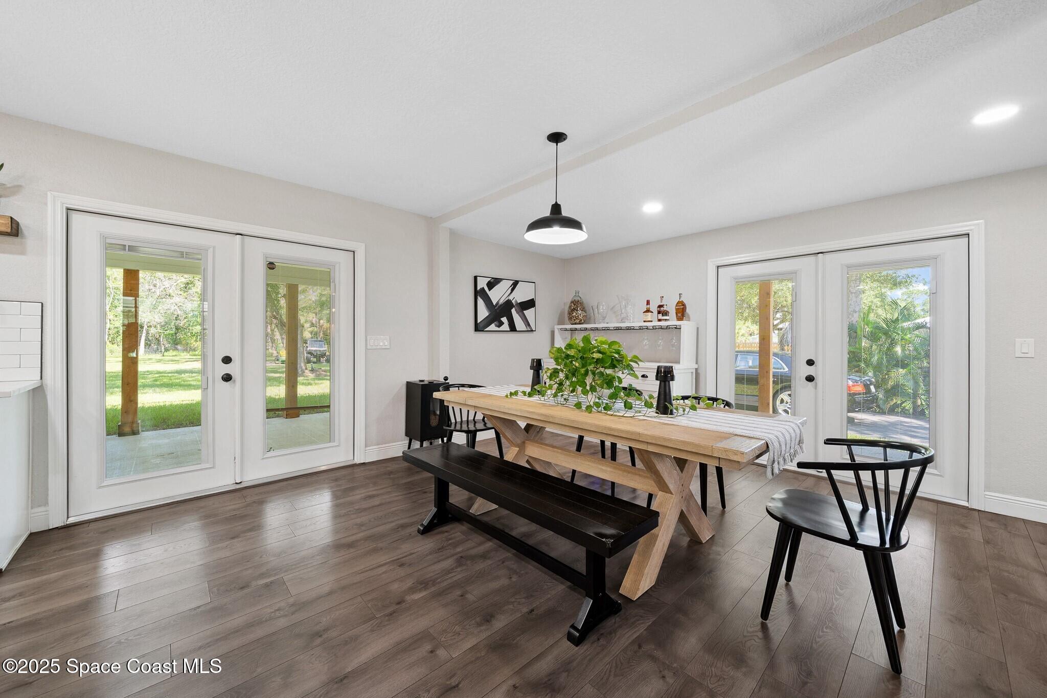 1325 Friday Road Cocoa, FL 32926 - Photo 15 of 59 a living room with furniture and a wooden floor