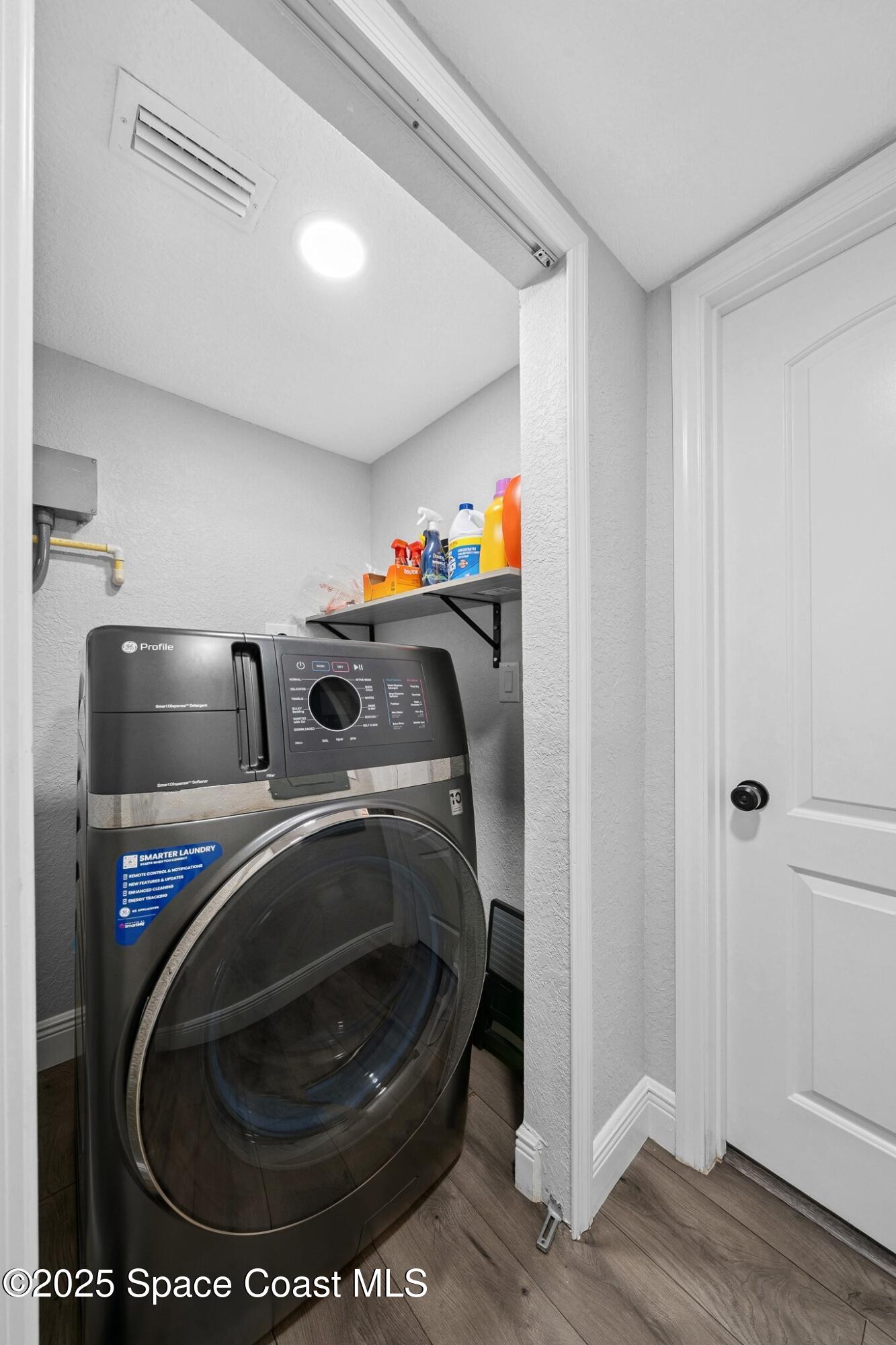 1325 Friday Road Cocoa, FL 32926 - Photo 22 of 59 a utility room with dryer and washer