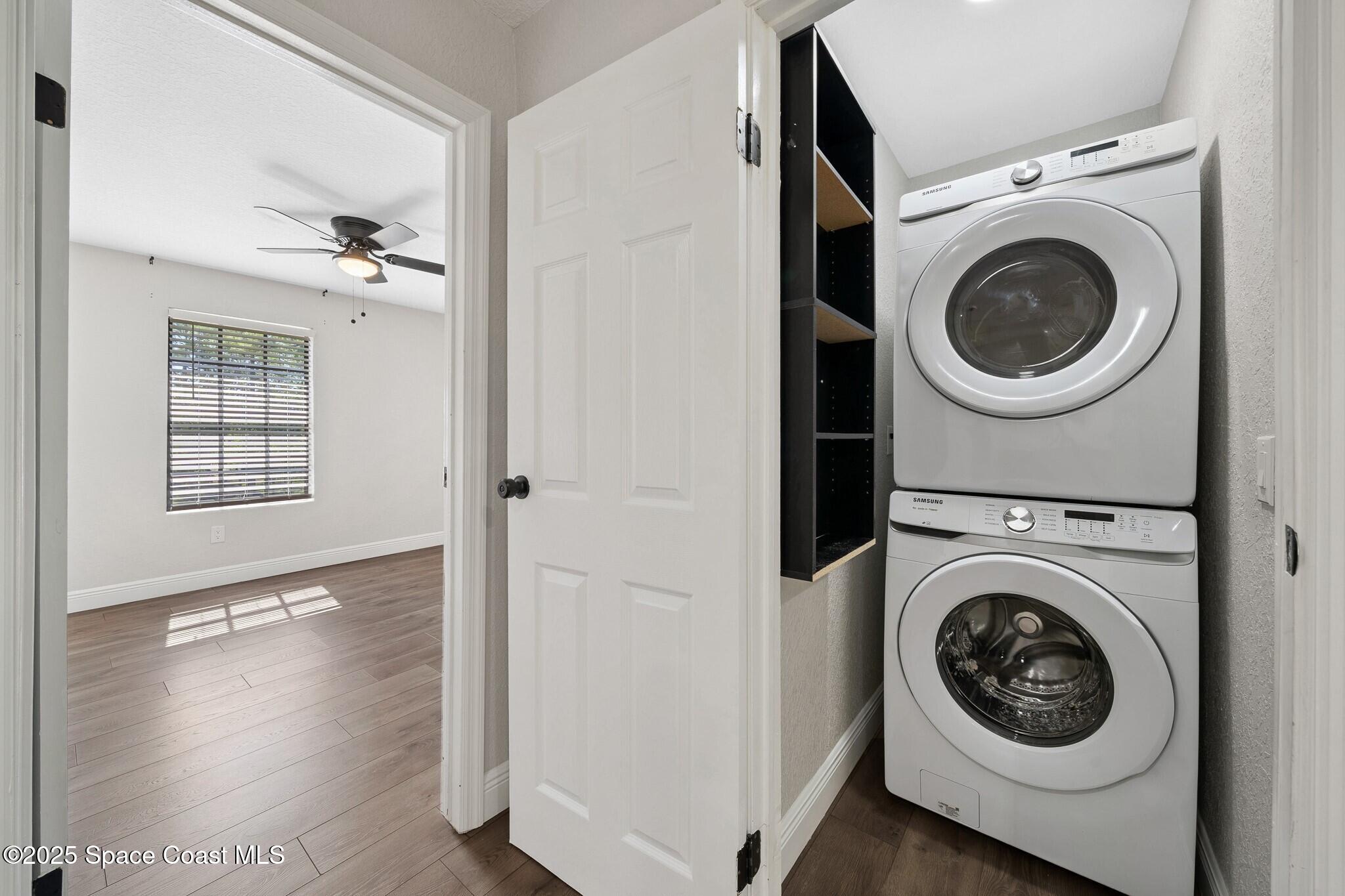 1325 Friday Road Cocoa, FL 32926 - Photo 25 of 59 a view of a hallway with washer and dryer