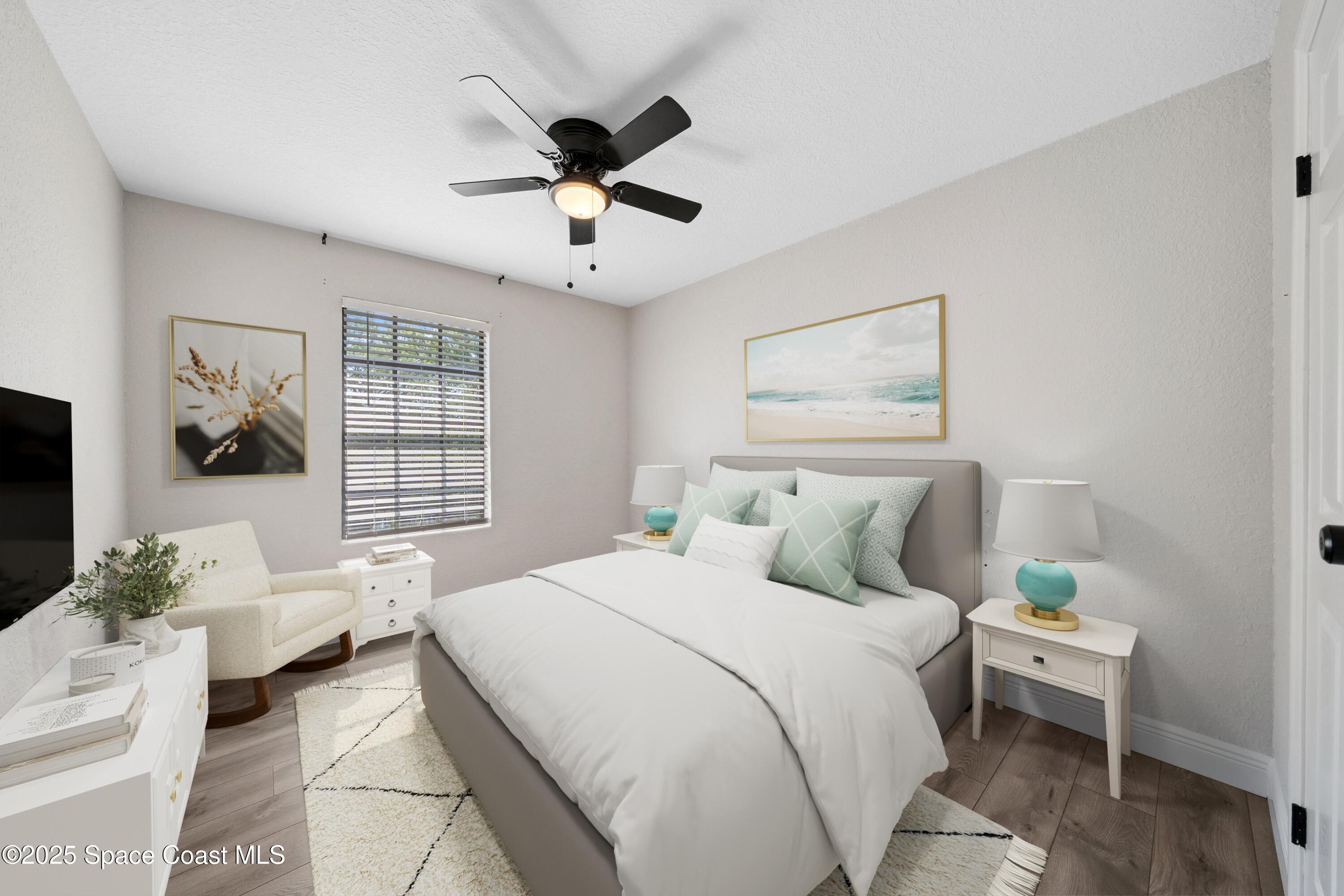 1325 Friday Road Cocoa, FL 32926 - Photo 29 of 59 a bedroom with a large bed and a window