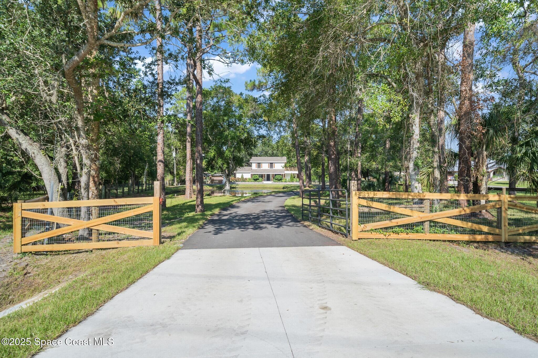 1325 Friday Road Cocoa, FL 32926 - Photo 3 of 59 004_Gate Entry