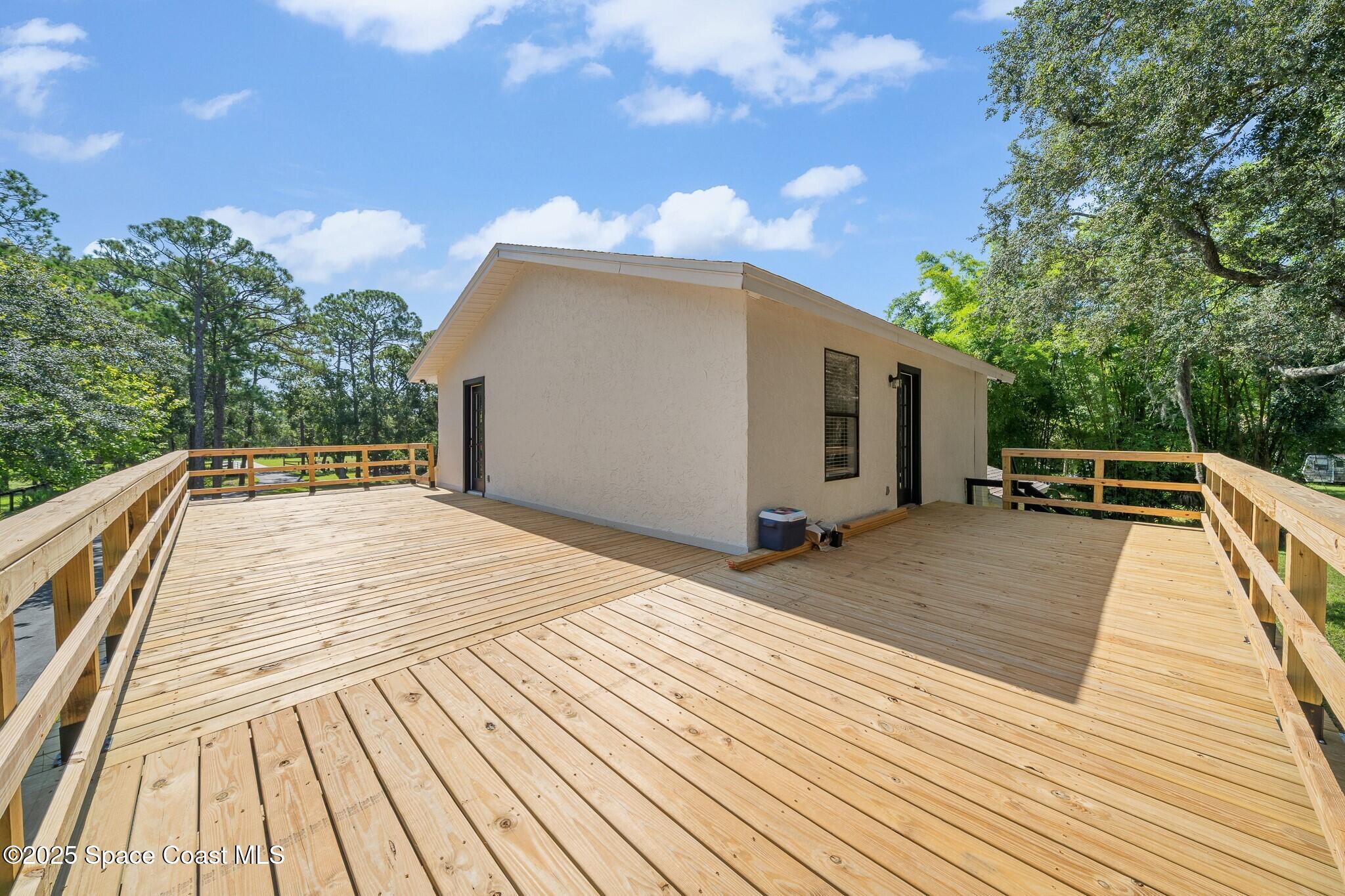1325 Friday Road Cocoa, FL 32926 - Photo 36 of 59 a view of a house with wooden floor