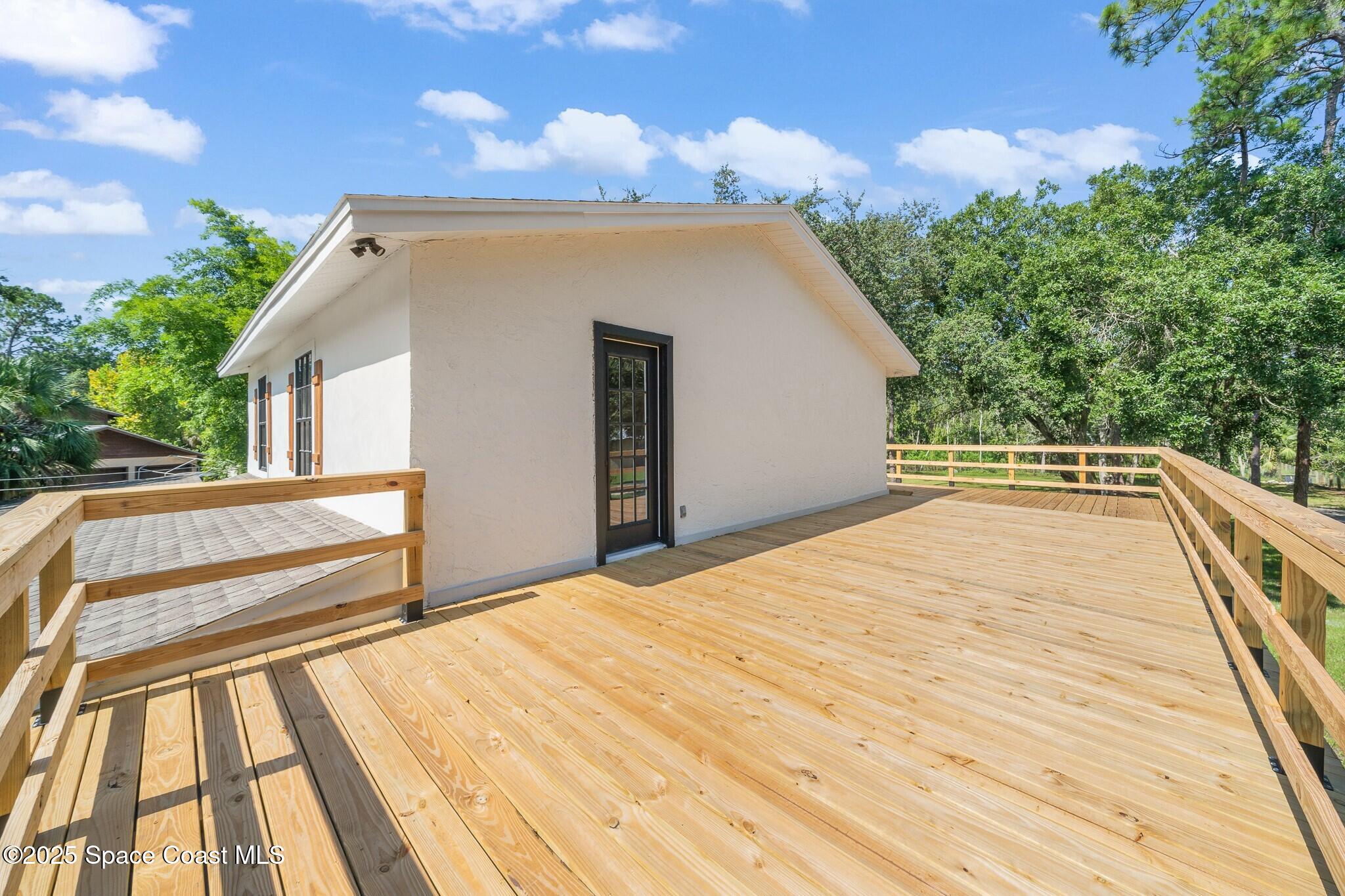 1325 Friday Road Cocoa, FL 32926 - Photo 37 of 59 a view of balcony with deck
