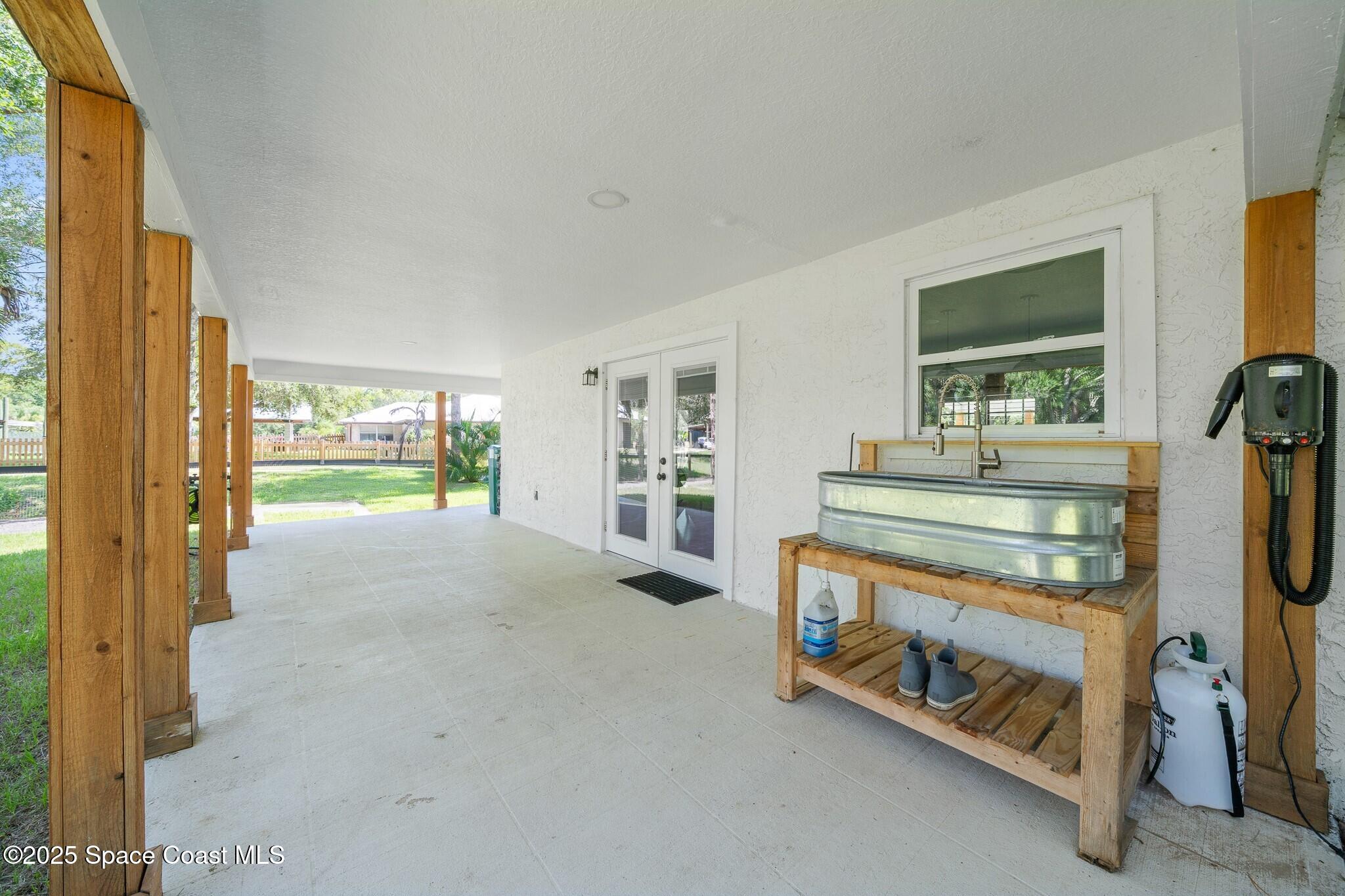 1325 Friday Road Cocoa, FL 32926 - Photo 38 of 59 038_Covered Patio with Sink