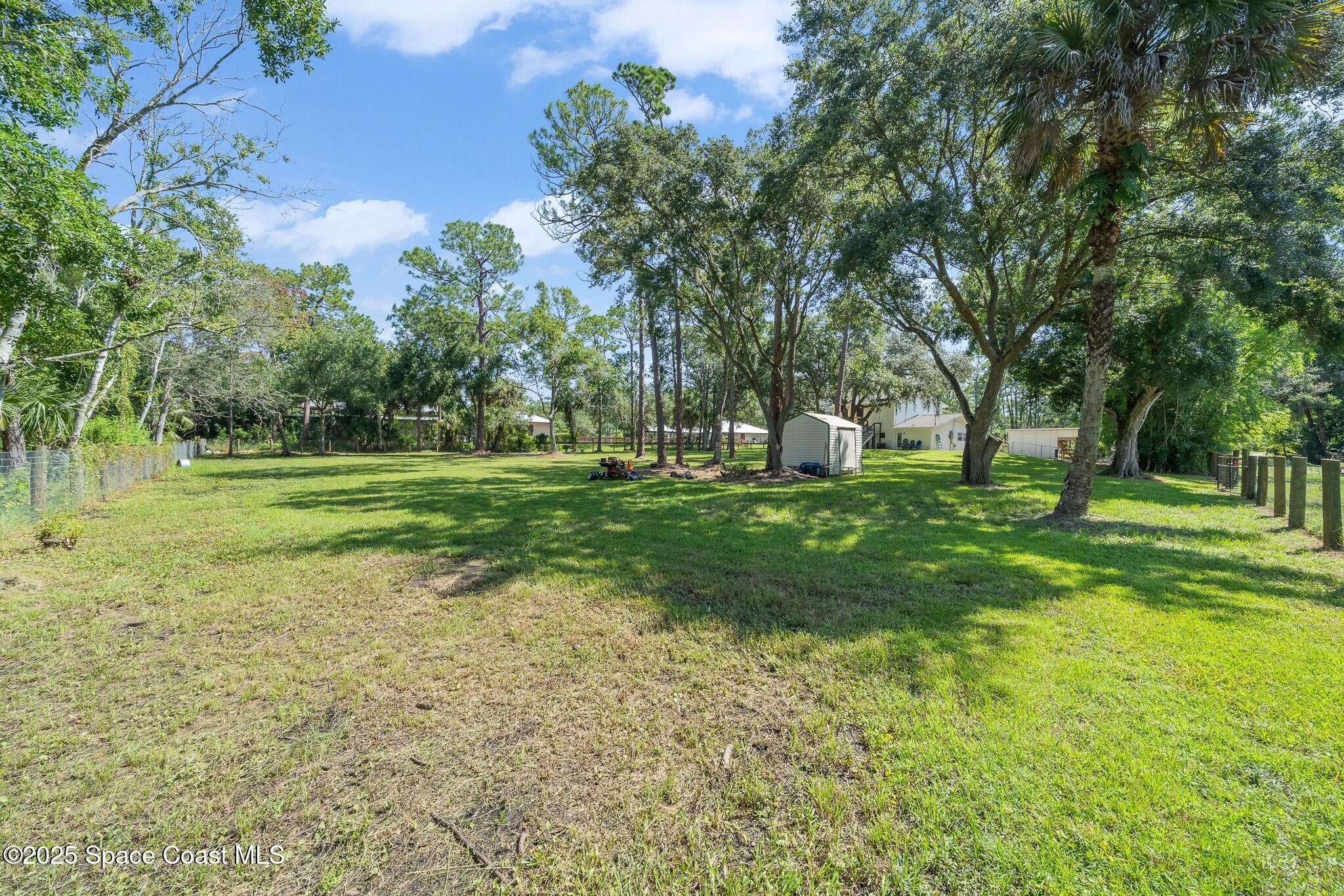 1325 Friday Road Cocoa, FL 32926 - Photo 45 of 59 a view of a park with large trees