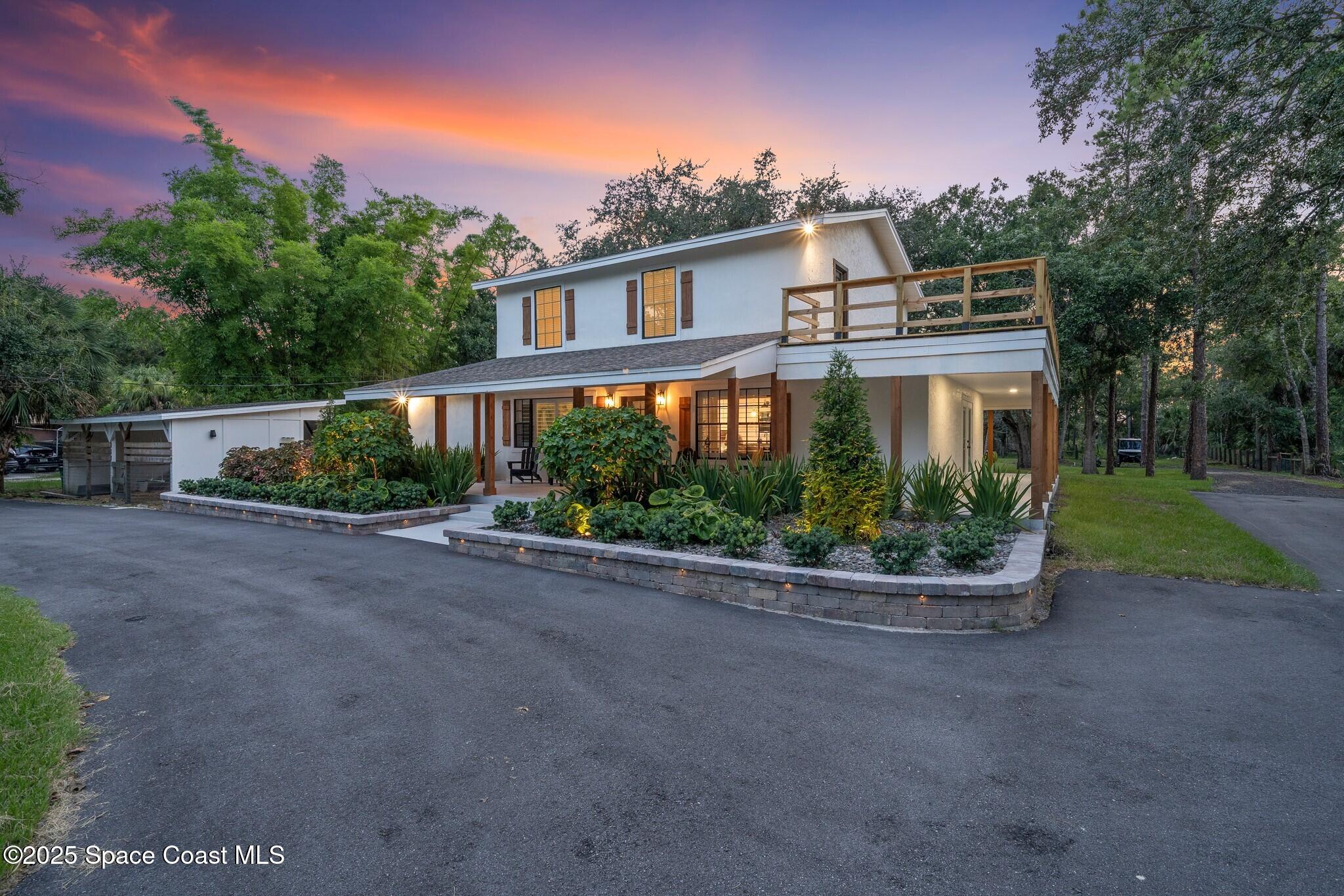 1325 Friday Road Cocoa, FL 32926 - Photo 5 of 59 a front view of a house with a yard