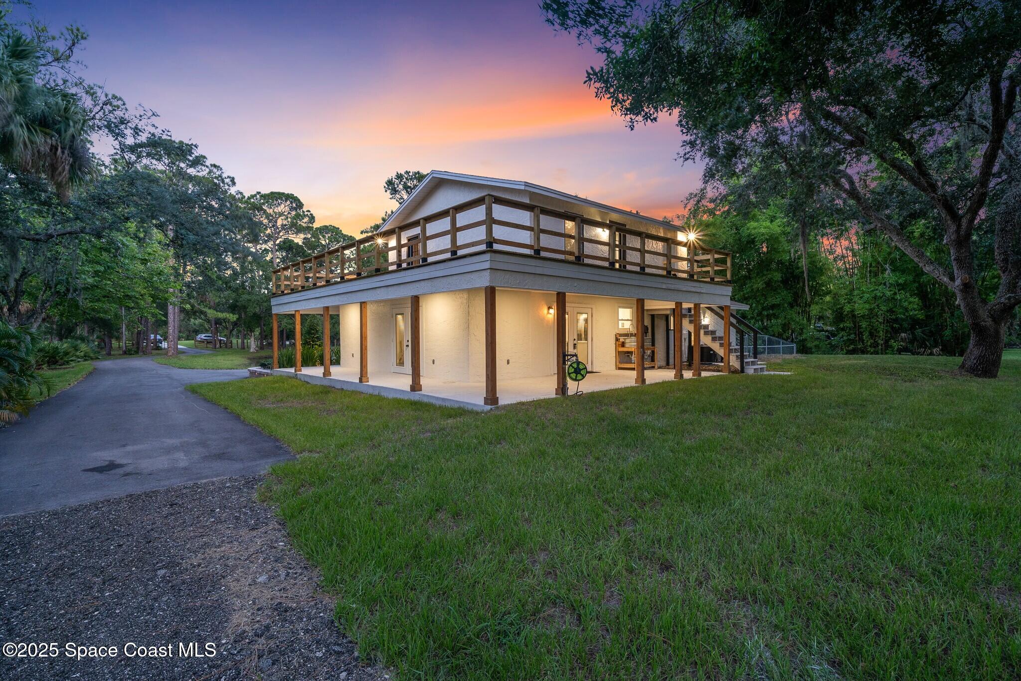 1325 Friday Road Cocoa, FL 32926 - Photo 59 of 59 a view of a house with a yard