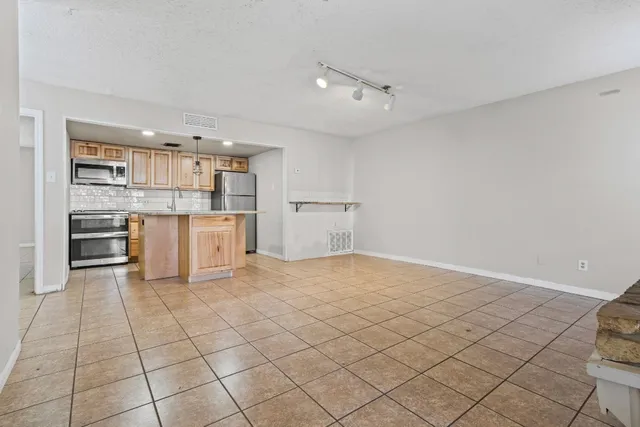 a kitchen with a cabinets and counter space
