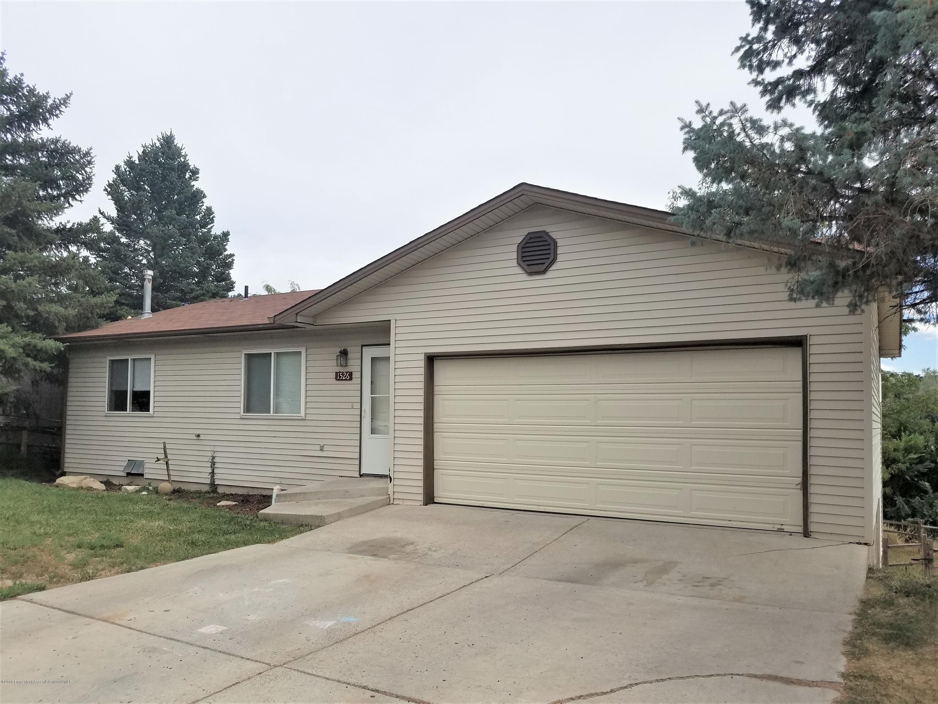 1526 Arabian Avenue Rifle, CO 81650 - Photo 3 of 20 a house view with a backyard space
