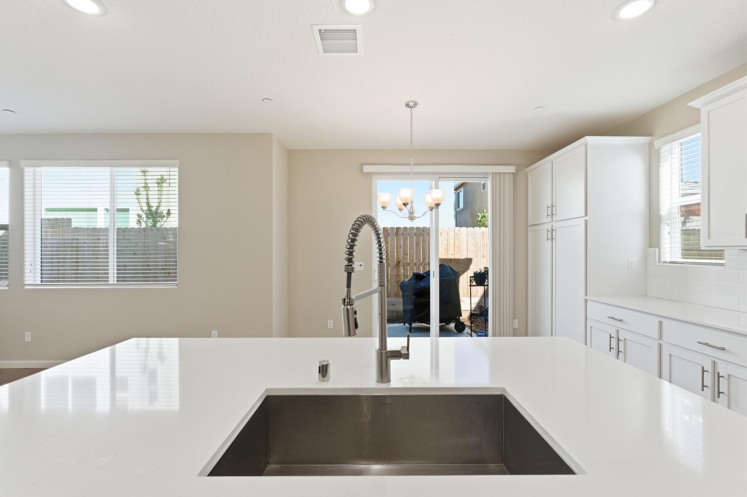 1107 Significant Way West Madera, CA 93636 - Photo 18 of 42 a view of a kitchen with furniture and window
