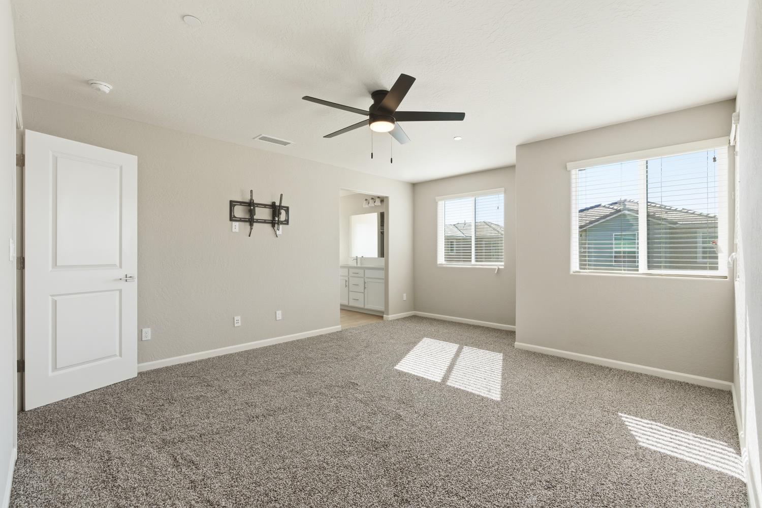 1107 Significant Way West Madera, CA 93636 - Photo 26 of 42 a view of an empty room with a window