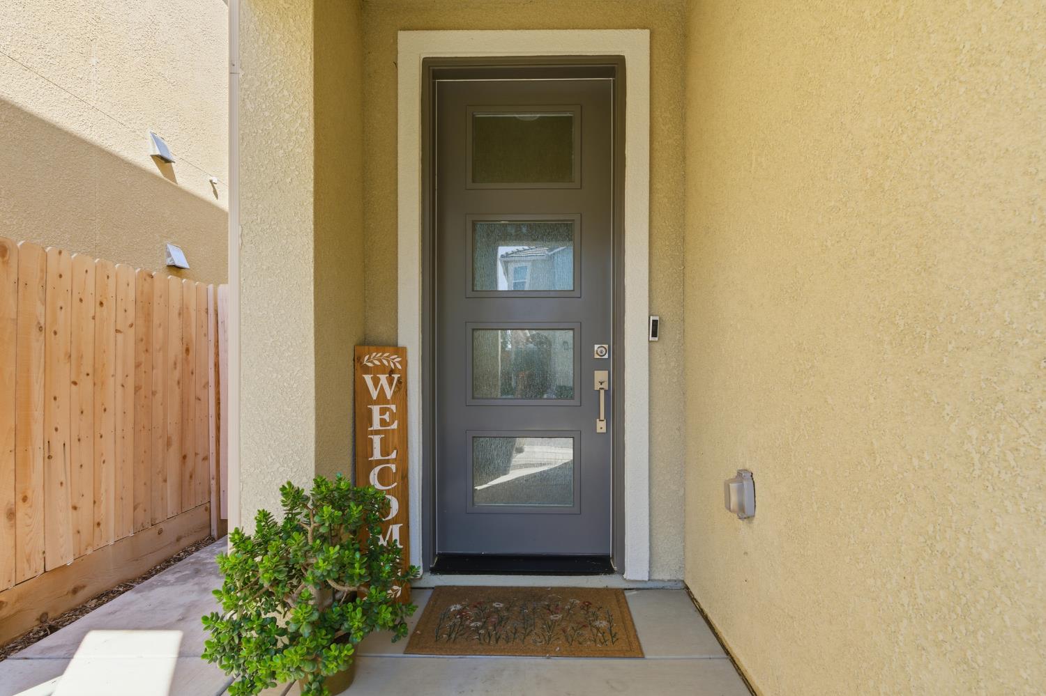 1107 Significant Way West Madera, CA 93636 - Photo 7 of 42 a view of an entryway door