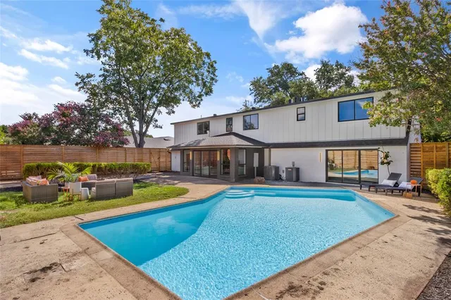 a view of a hallway with washer and dryer