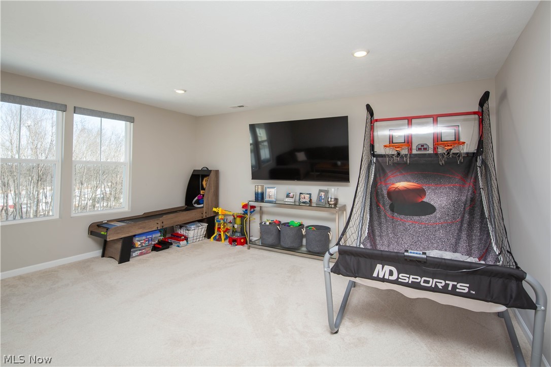 150 Seamore Road Aurora, OH 44202 - Photo 37 of 50 Game room featuring carpet flooring and recessed lighting