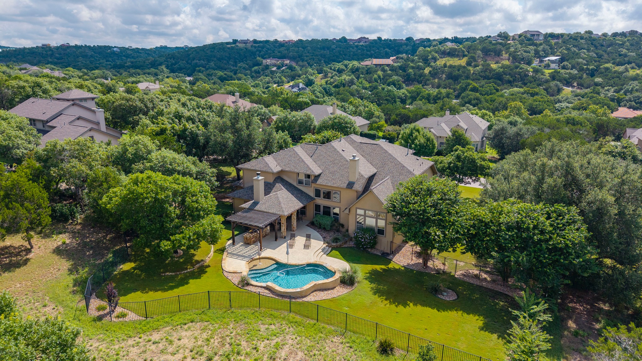 1301 Lions Lair Leander, TX 78641 - Photo 38 of 40 Aerial perspective highlighting privacy, acreage, and setting - View 2