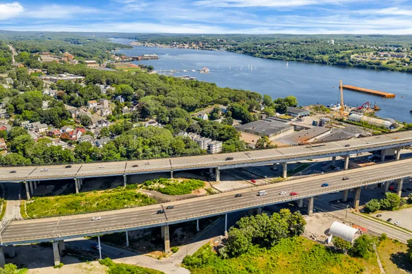 an aerial view of a house with a lake view