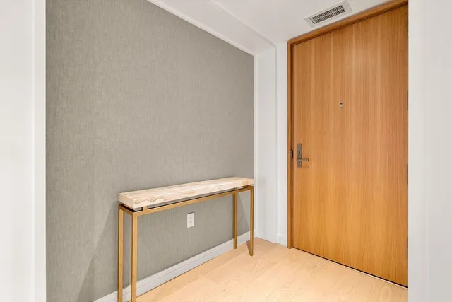 a view of a balcony with chairs