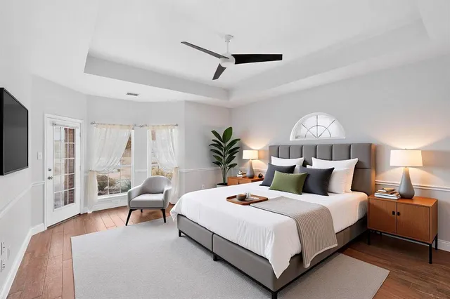 a bathroom with a sink a toilet a shower and a mirror