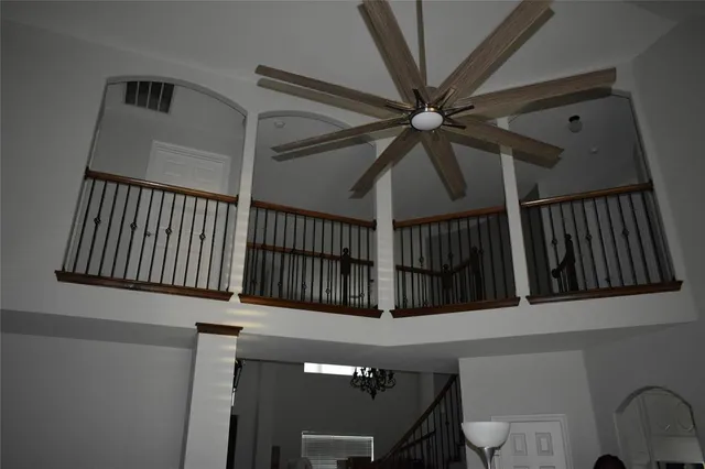 a bathroom with a toilet a sink and a mirror