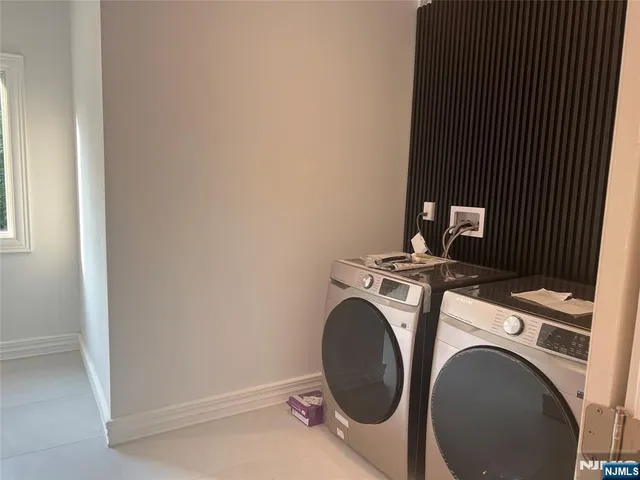 a view of a hallway with a chandelier