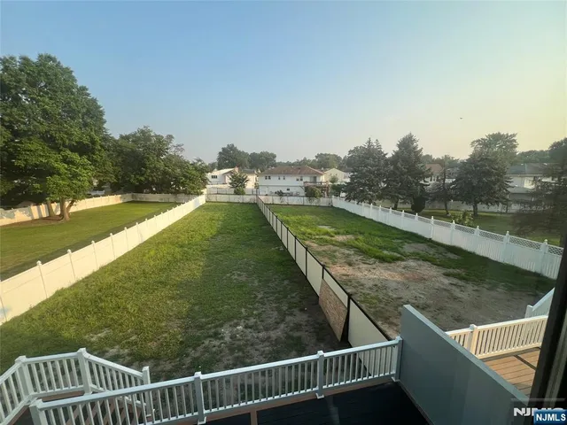 a view of balcony with furniture