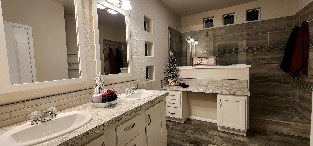 51382 Welch Road La Pine, OR 97739 - Photo 13 of 19 Primary bathroom with walk in shower and private commode area.