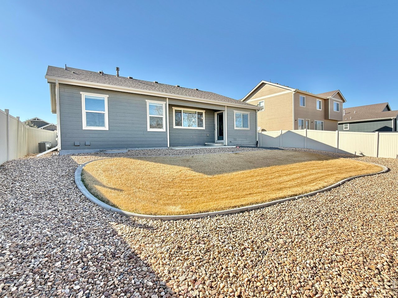 640 Cimarron Trail Ault, CO 80610 - Photo 13 of 15 a view of a house with a swimming pool