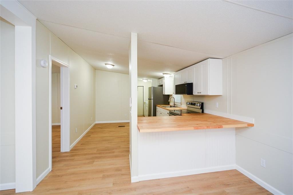 50 Damascus Road Talking Rock, GA 30175 - Photo 13 of 39 a view of kitchen with wooden floor