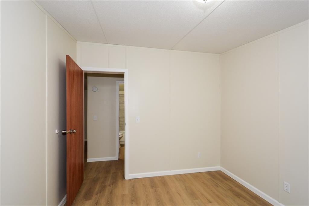 50 Damascus Road Talking Rock, GA 30175 - Photo 27 of 39 wooden floor in an empty room