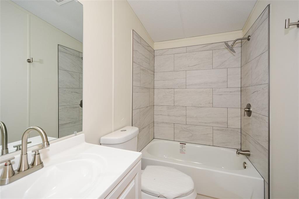50 Damascus Road Talking Rock, GA 30175 - Photo 33 of 39 a bathroom with a sink toilet and shower
