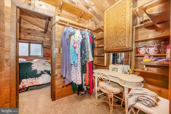 a view of a dinning table and chairs in the patio