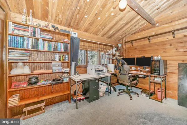 a view of a workspace with furniture