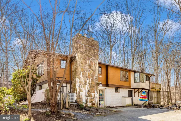 a street sign on a pole on a street