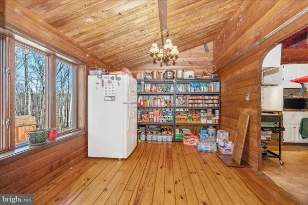 a view of livingroom with furniture and wooden floor