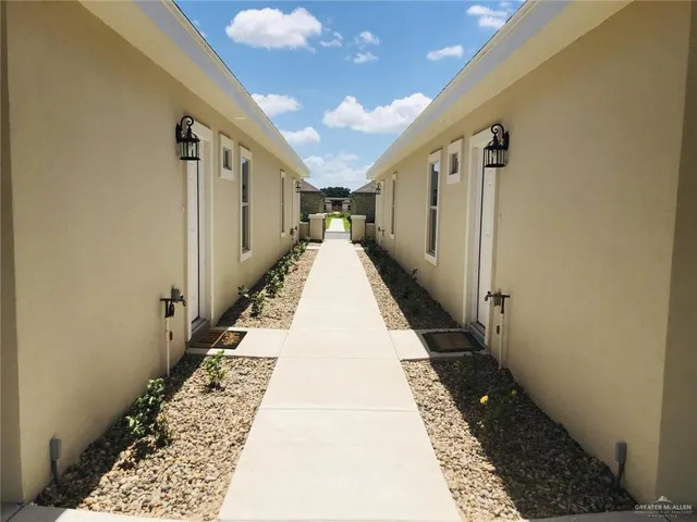 a view of balcony with wooden floor