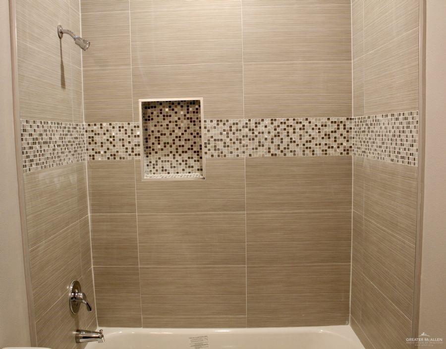 1901 Jackson Street, Unit 4 Weslaco, TX 78599 - Photo 8 of 10 a bathroom with a shower