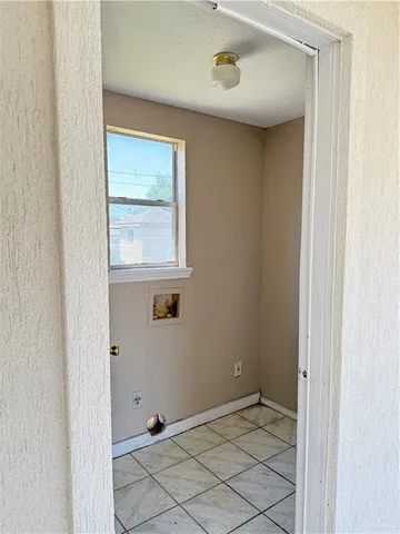 a view of an empty room with window