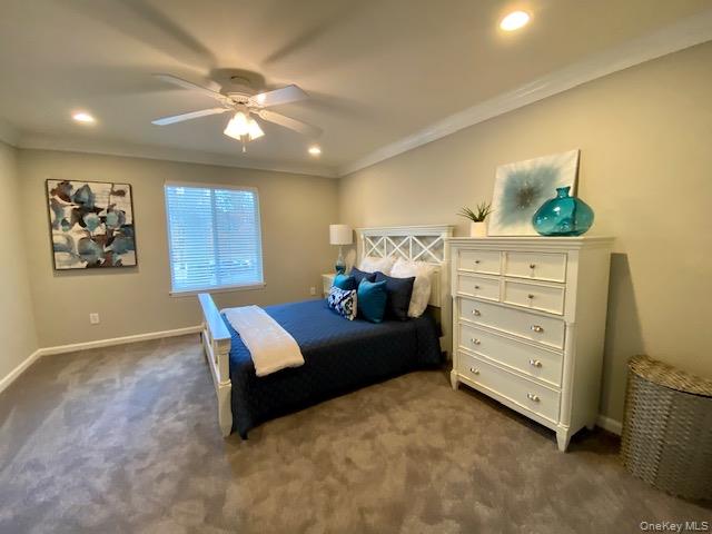 32 Country Club Drive, Unit 32C Coram, NY 11727 - Photo 7 of 8 a living room with furniture and decor