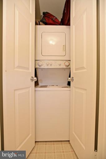 1521 Church Hill Place, Unit 1521 Reston, VA 20194 - Photo 13 of 20 a utility room with dryer and washer