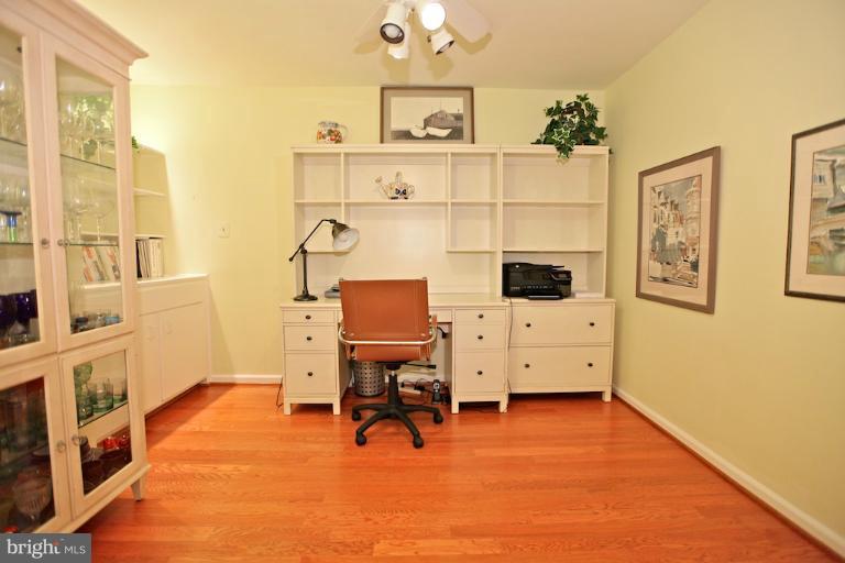 1521 Church Hill Place, Unit 1521 Reston, VA 20194 - Photo 19 of 20 a view of a workspace with furniture and a window